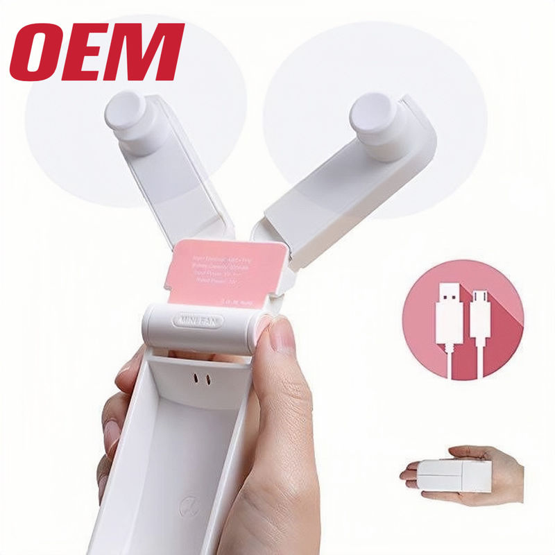 Mini ventilador de refrigeración portátil OEM de verano ventilador portátil hecho de mano linda batería de litio plegable de plástico dibujo animado de verano